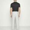 Pantalon Puma Dealer Pantalon Puma Dealer